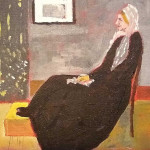 Old woman dressed in black sitting in a chair